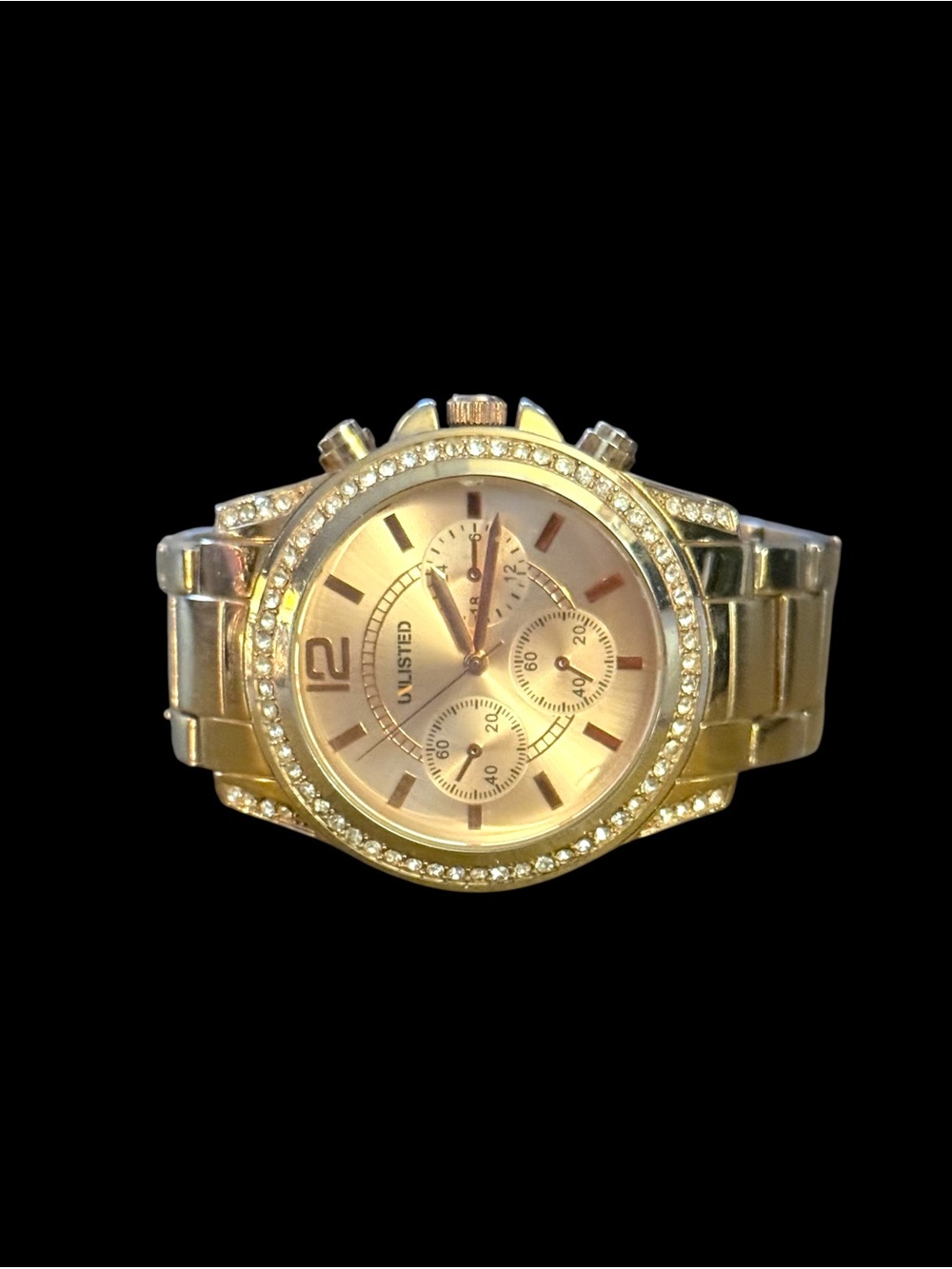 Unlisted by Kenneth Cole gold stainless steel crystal bezel watch